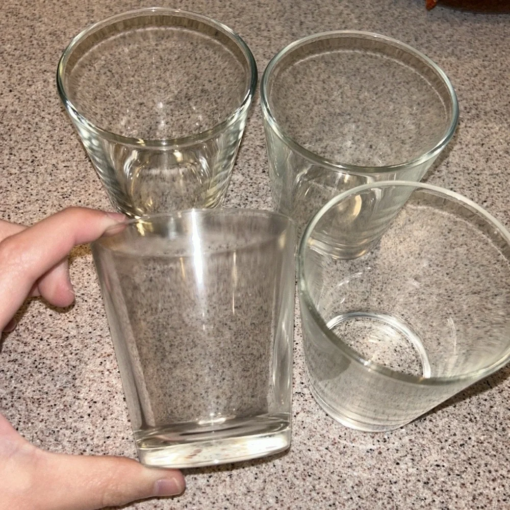Four small water bottles
